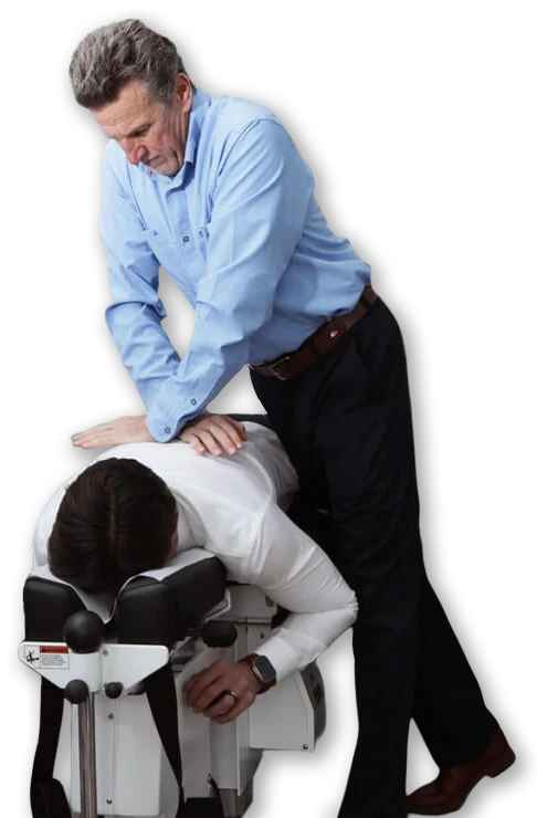 Snowmass Village James Bolger Adjusting the Back of a Male Patient